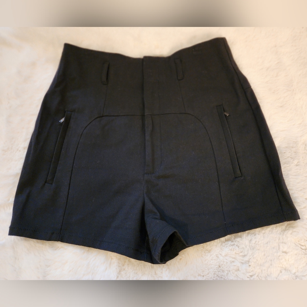 Guess by Marciano. High waisted short. Black. Size 4.